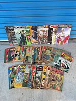 Full lot overview showing magazines at rear and comics spread out