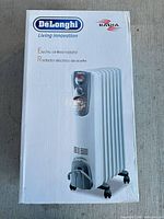 Front of factory-sealed DeLonghi Radia heater box