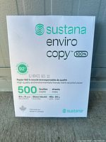 Front view of sealed ream showing brand, product name, sheet count, size, weight, brightness, recycled content