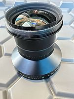 Front oblique view showing optics and overall body