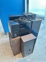 Group of all speakers stacked together with cabling