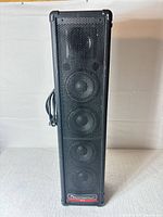 Front view showing grille and four drivers