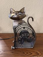 Front view showing cat form and fan housing