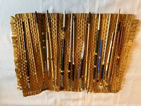 Full view of woven bamboo holder with all brushes secured