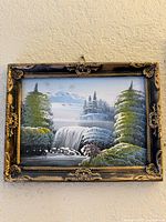 Front view of framed painting showing full artwork and frame detail