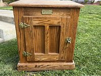 Front view of oak White Clad cabinet