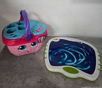 Fisher-Price picnic basket and Crayola light-up board