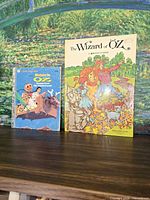 Front covers of The Wizard of Oz pop-up and Return to Oz Little Golden Book