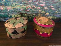 Both tins side by side showing overall design