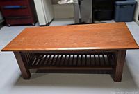 Full view of coffee table showing top, sides and lower shelf