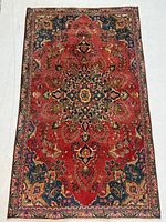 Full view of Mashad rug showing design, size, overall wear