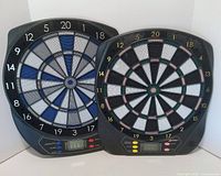 Both electronic dartboards side by side