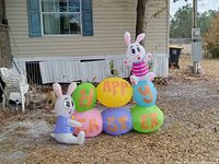 Front view showing bunnies and eggs spelling HAPPY EASTER