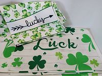 both placemat and runner stacked, showing designs