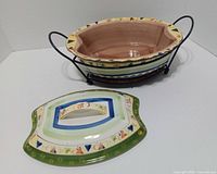 Casserole dish inside metal rack, lid removed