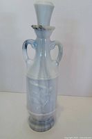 Full view of decanter standing upright