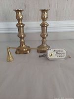 pair of candlesticks, snuffer, Baldwin tag visible