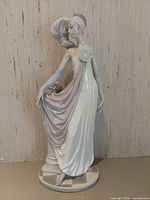 Front view of Lladro figurine showing full pose and colors