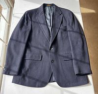 Front view of navy cashmere sport coat showing overall condition and two-button closure
