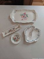 All four bone china pieces laid out