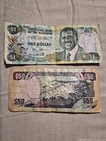 Obverse sides of both banknotes displaying portraits and denominations