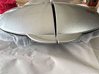 Closed silver GT Xpress unit with foam wrap