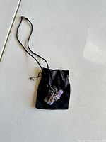 Necklace and pouch overview