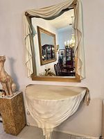 Wall mirror and demilune shelf front view