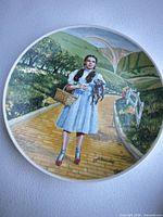 Front view of plate showing Dorothy scene