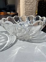 Clear crystal Mikasa bowl showing swirl pattern and scalloped rim