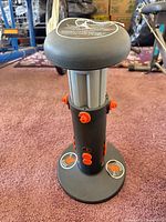 Full view of Squat Magic trainer showing padded seat and body