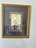 Full view of framed print on wall