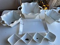 All six porcelain pieces displayed together