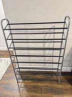 Front view of silver/gray 8-tier metal shoe rack