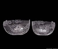 Front view of both pressed glass bowls showing size and floral design