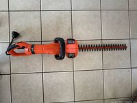 Full view of trimmer showing complete body and blade