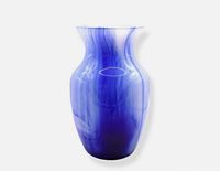 Full view of blue and white swirl glass vase