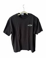 Front of black T-shirt with small Chevrolet logo left chest