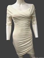 Front view of white off-shoulder ruched dress on mannequin