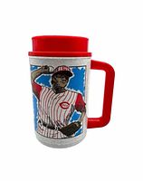 Front view showing illustrated pitcher graphic and red handle