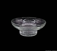 Full view of clear glass candy dish showing bowl and ribbed pedestal base
