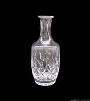 Full view of clear cut crystal carafe showing overall form and pattern