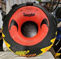 Front view showing Sevylor logo, red center, flame graphics
