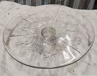 Top view showing etched floral design and cracks