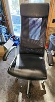 Front view of black mesh back office chair