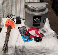 Full lot overview showing transmitter, collar, flags, batteries