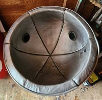 Interior view showing padded lining and two speaker grilles