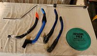 Overview of four snorkels, LED anchor light pole, and turquoise flying disc