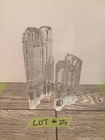 Front view of both crystal candle holders standing upright