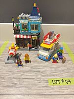 Both assembled LEGO sets with minifigures displayed